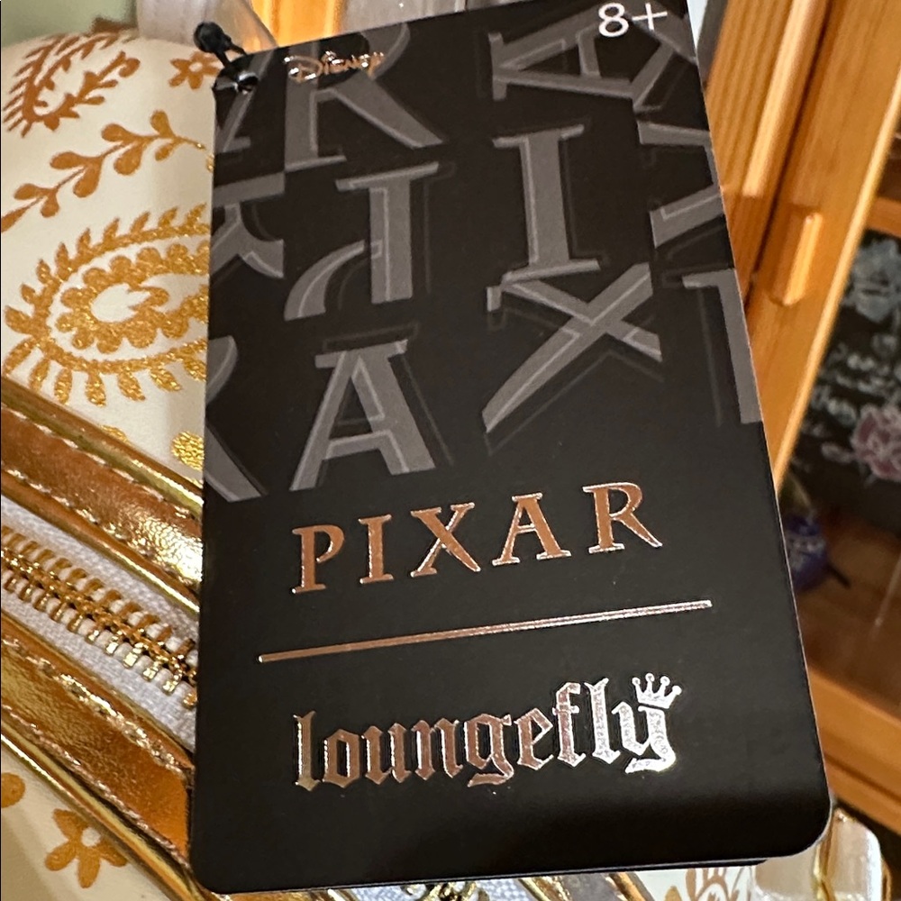 Loungefly Pixar Coco Ernesto De La Cruz Backpack in Gold Yellow and White. NWT - Picture 2 of 13